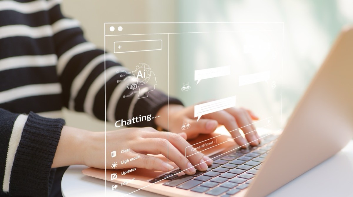 A woman using a computer and chatting with an artificial intelligence