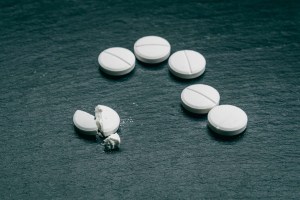 MDMA tablets on a black background