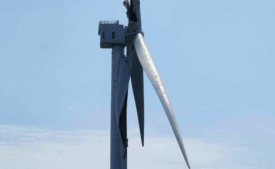 a wind turbine with damage to its blades