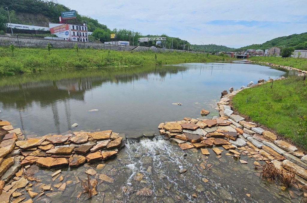 A body of water running through a town.