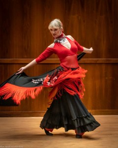 A woman dancing on a stage.