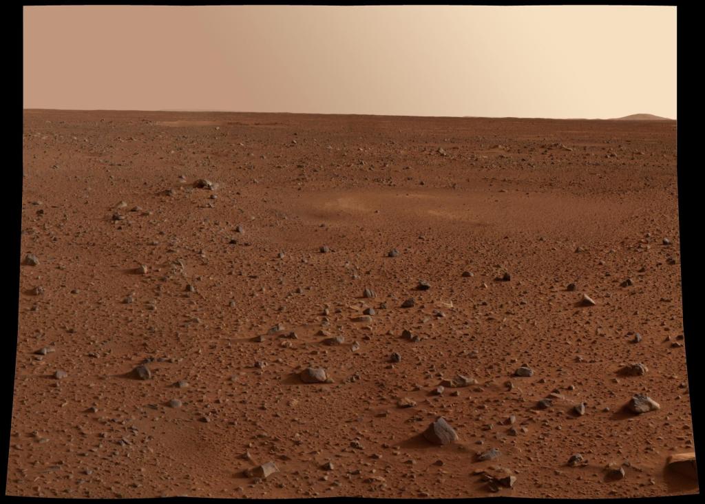 A landscape with reddish rocks and ground. A blank, yellow-ish sky