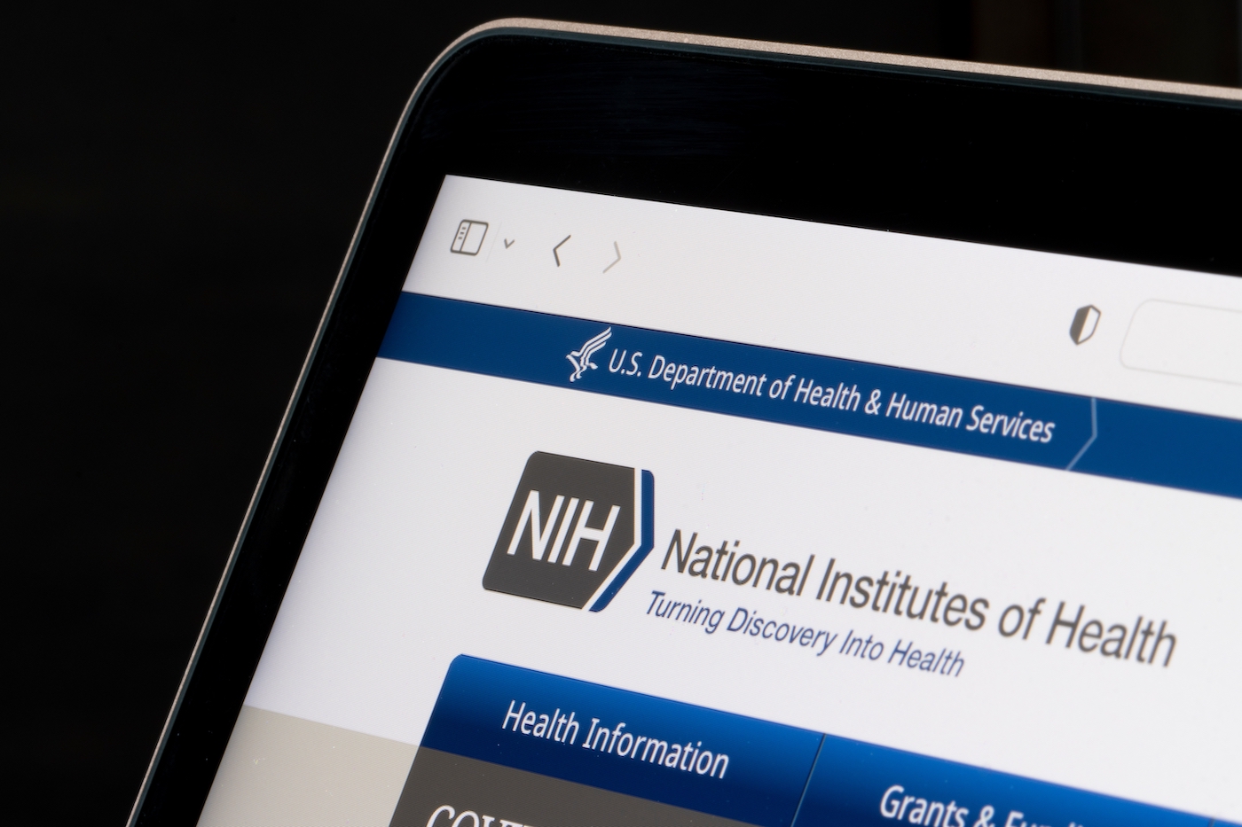 Website homepage of the National Institutes of Health (NIH) is seen on a laptop computer. NIH is the nation's medical research agency.