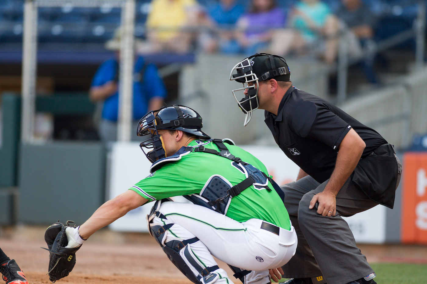 Catcher and Umpire on the field, MILB Gwinnett Stripers host Norfolk Tides on May 11th 2018 at the Coolray Field Baseball field in gwinnett County Georgia -USA